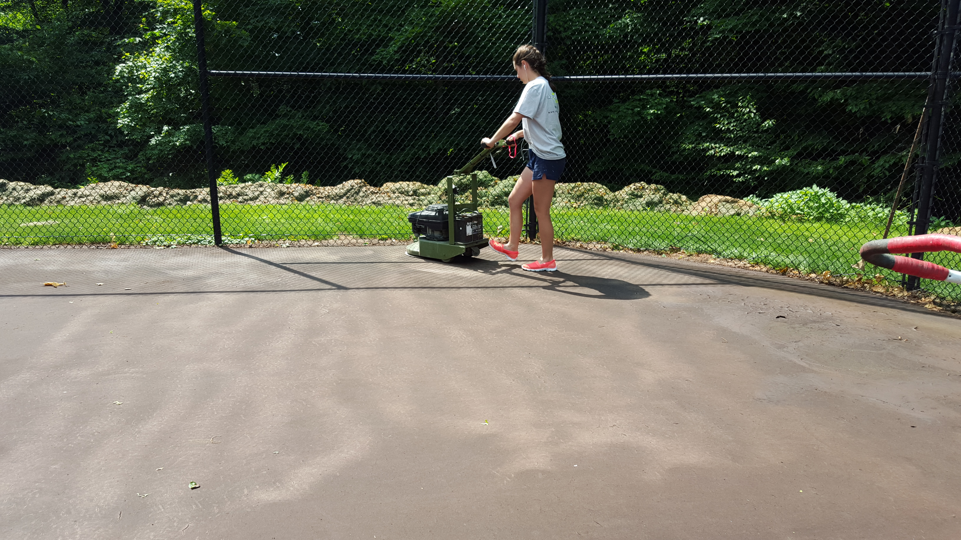 Sanding A Tennis Court Surface