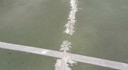 Crack filling repair on tennis court surfaces