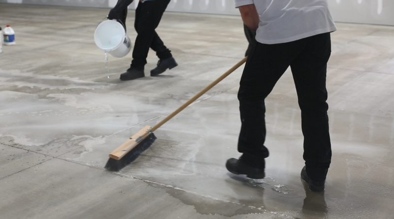 Pouring and Brooming Acid Concrete
